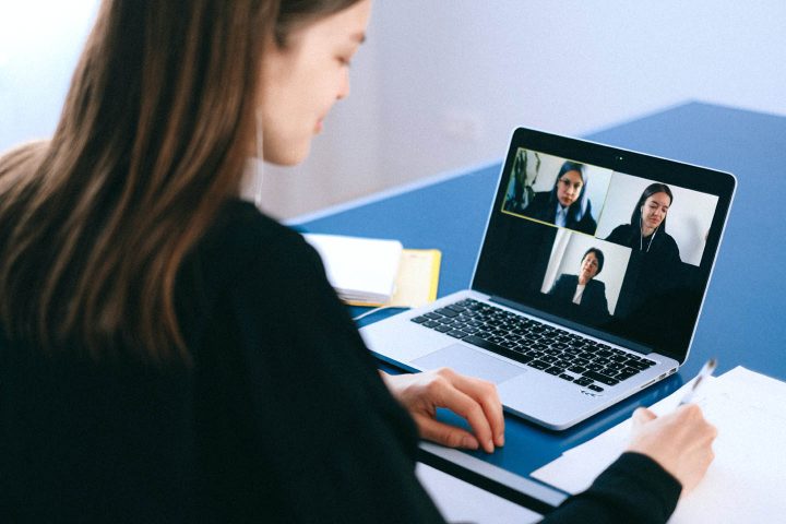 A woman participating in a Zoom meeting